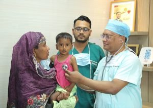 Cardiac surgeon Professor AKM Manzurul Alam checking his patient.