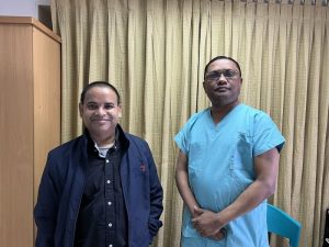 a cardiac surgeon with a recuperated patient